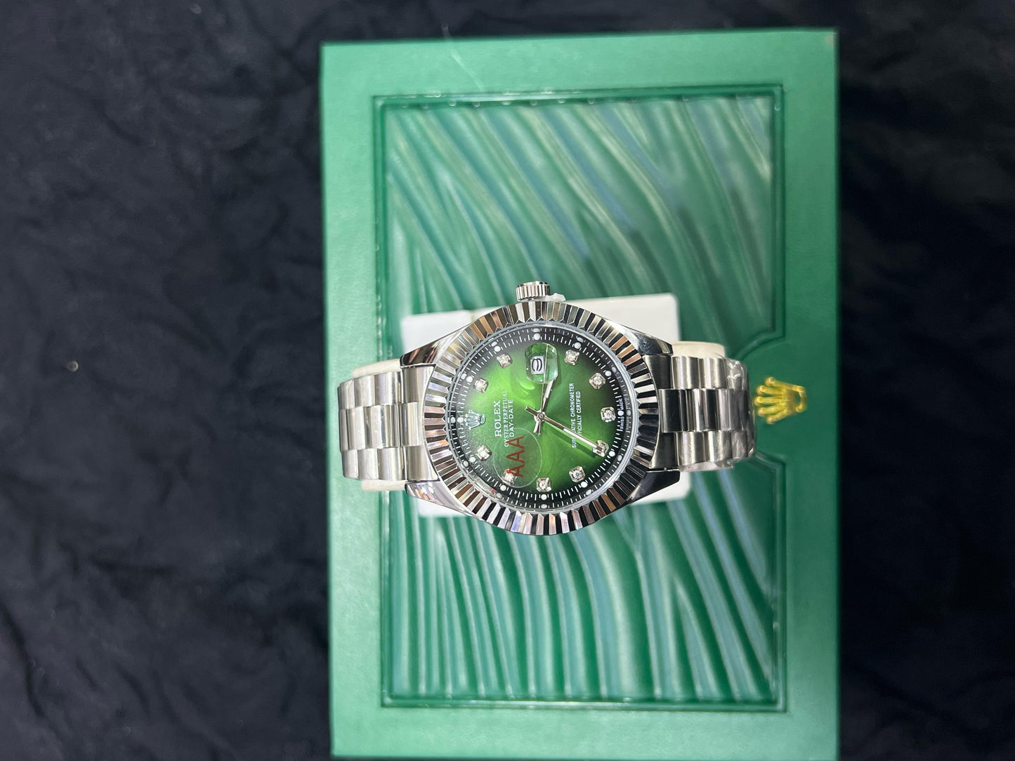 Rolex Silver Green Dial