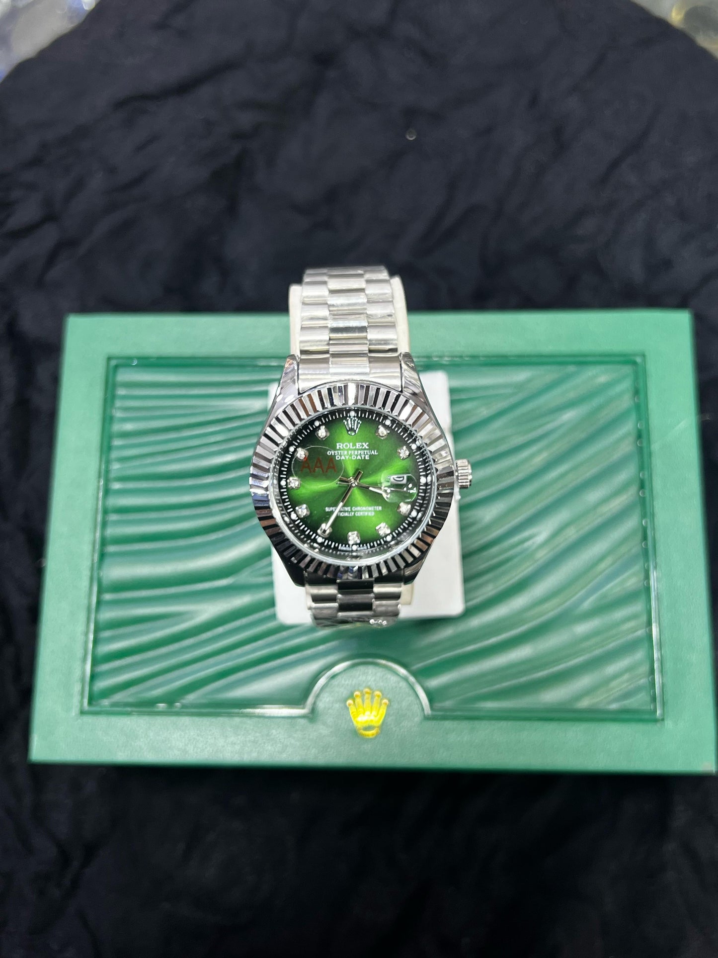 Rolex Silver Green Dial